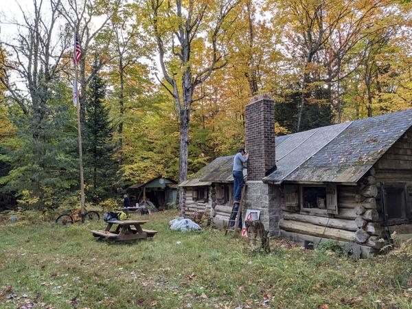 Mikey preparing to work on the roof around the chimney.