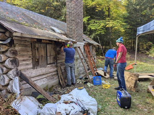 Andy working on patching the sill log.