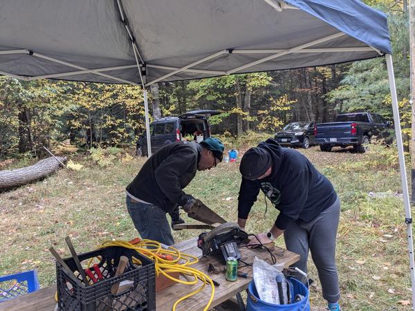 Bill and Jim working on pieces for the roof around the chimney.