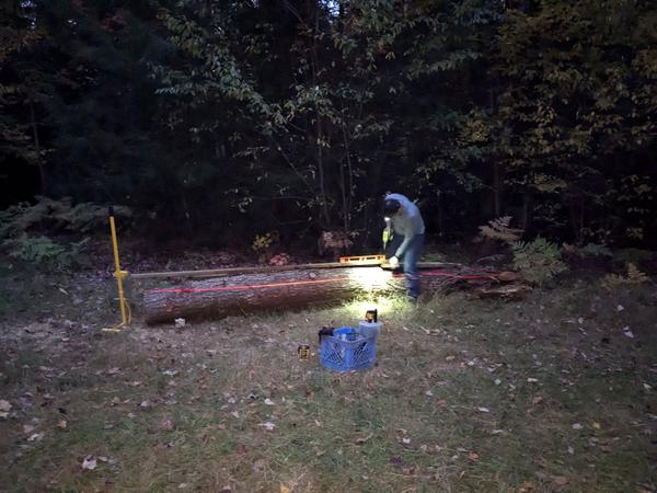 Mikey setting up the Alaskan saw mill.