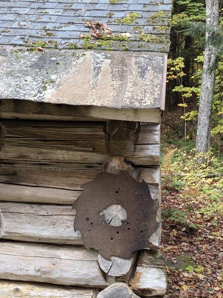 Old saw blade, now mounted on the Cabin.